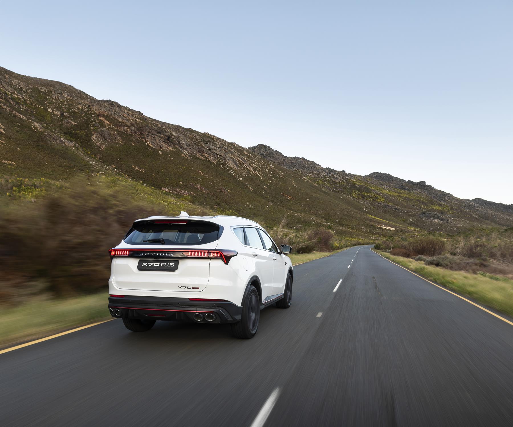 Jetour X70 Plus rear view on the road