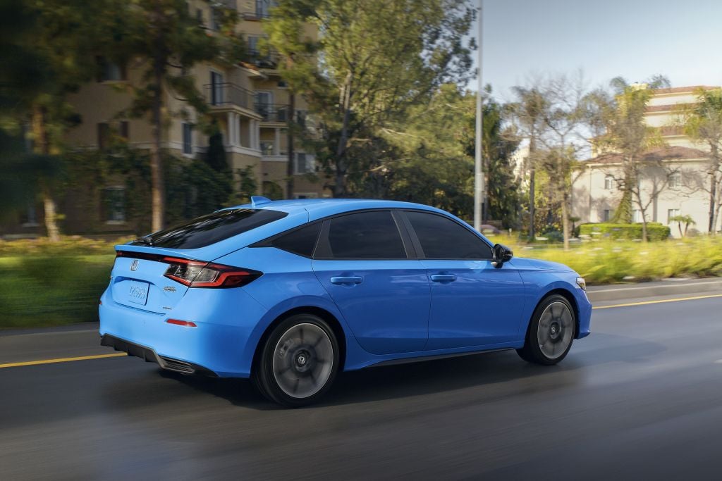 Honda Civic Hatch rear three-quarter view on the road