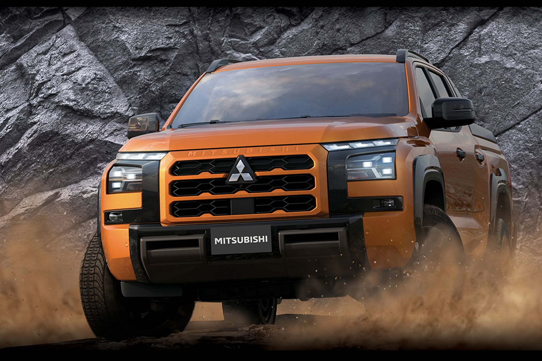 New Mitsubishi Triton on dirt road