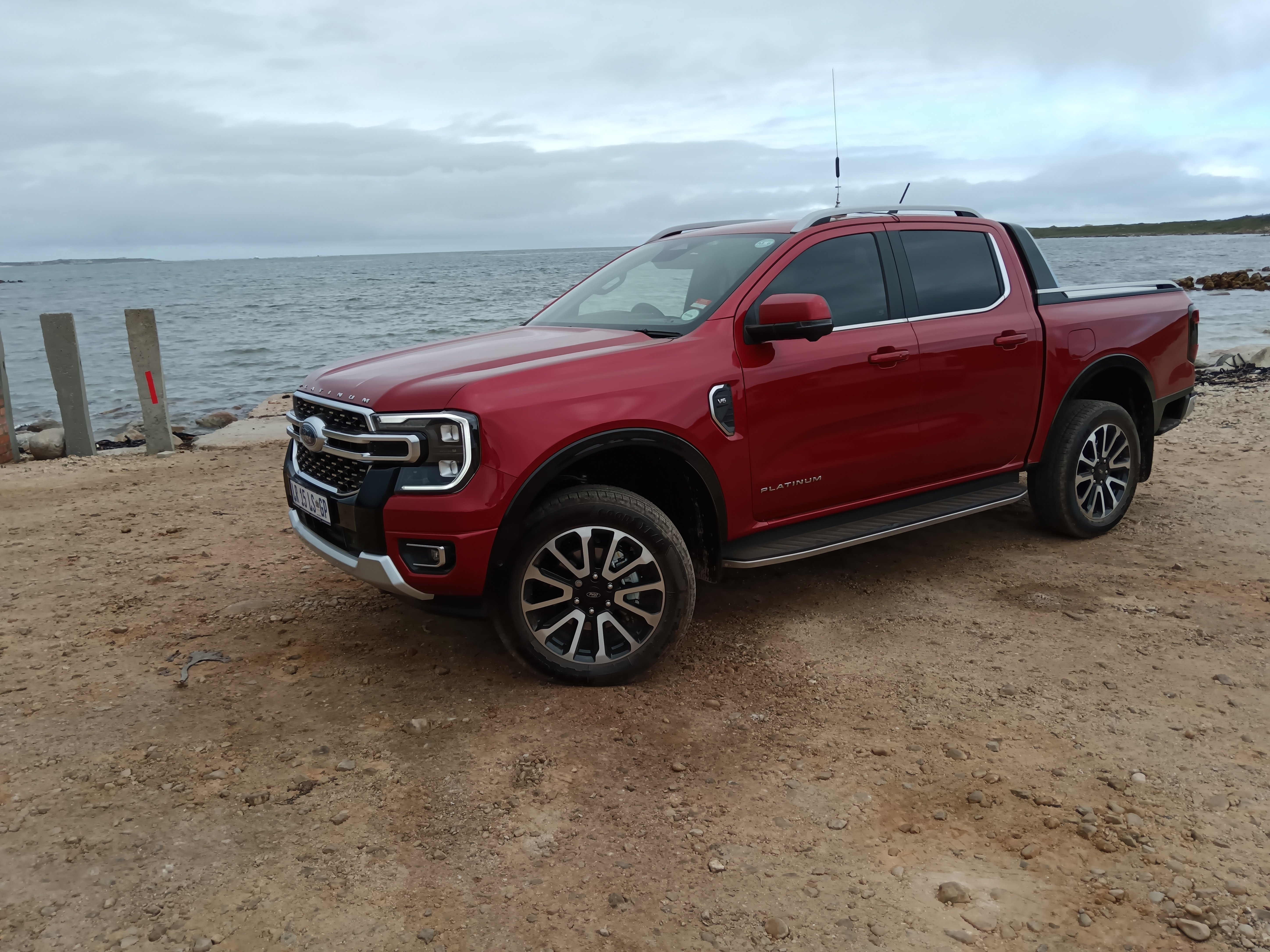 Red Ford Ranger Tremor next to a dam