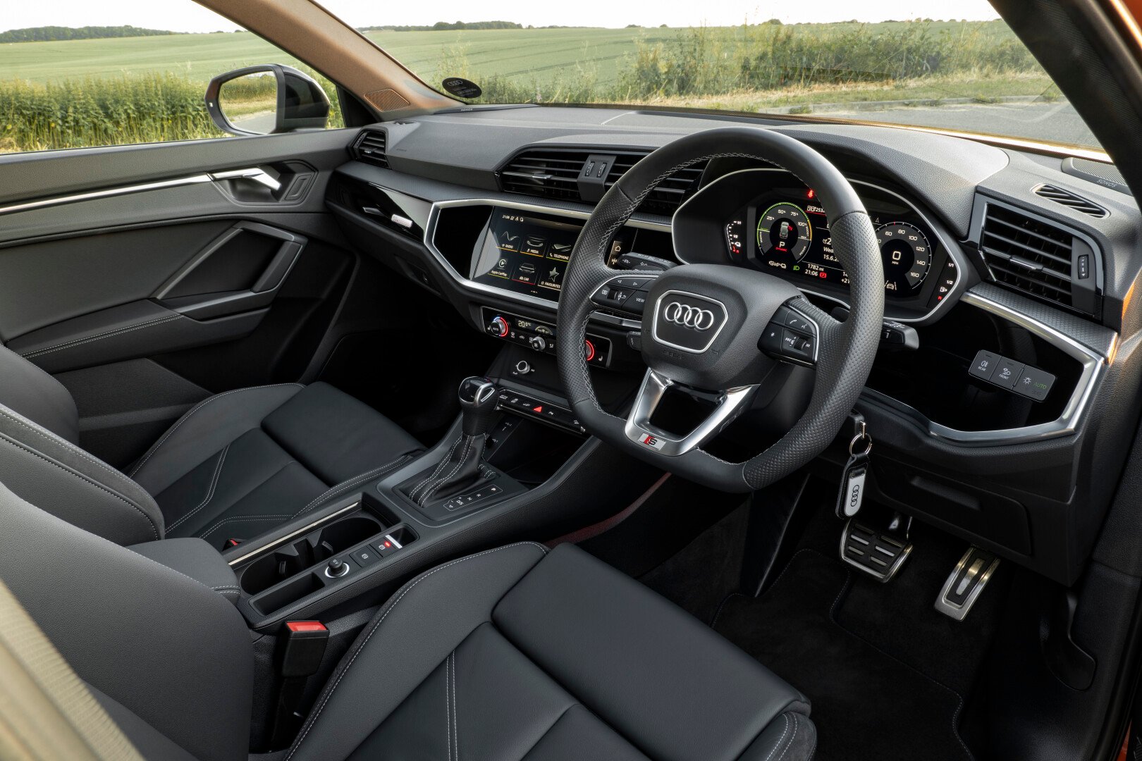 Audi dashboard view from driver's door