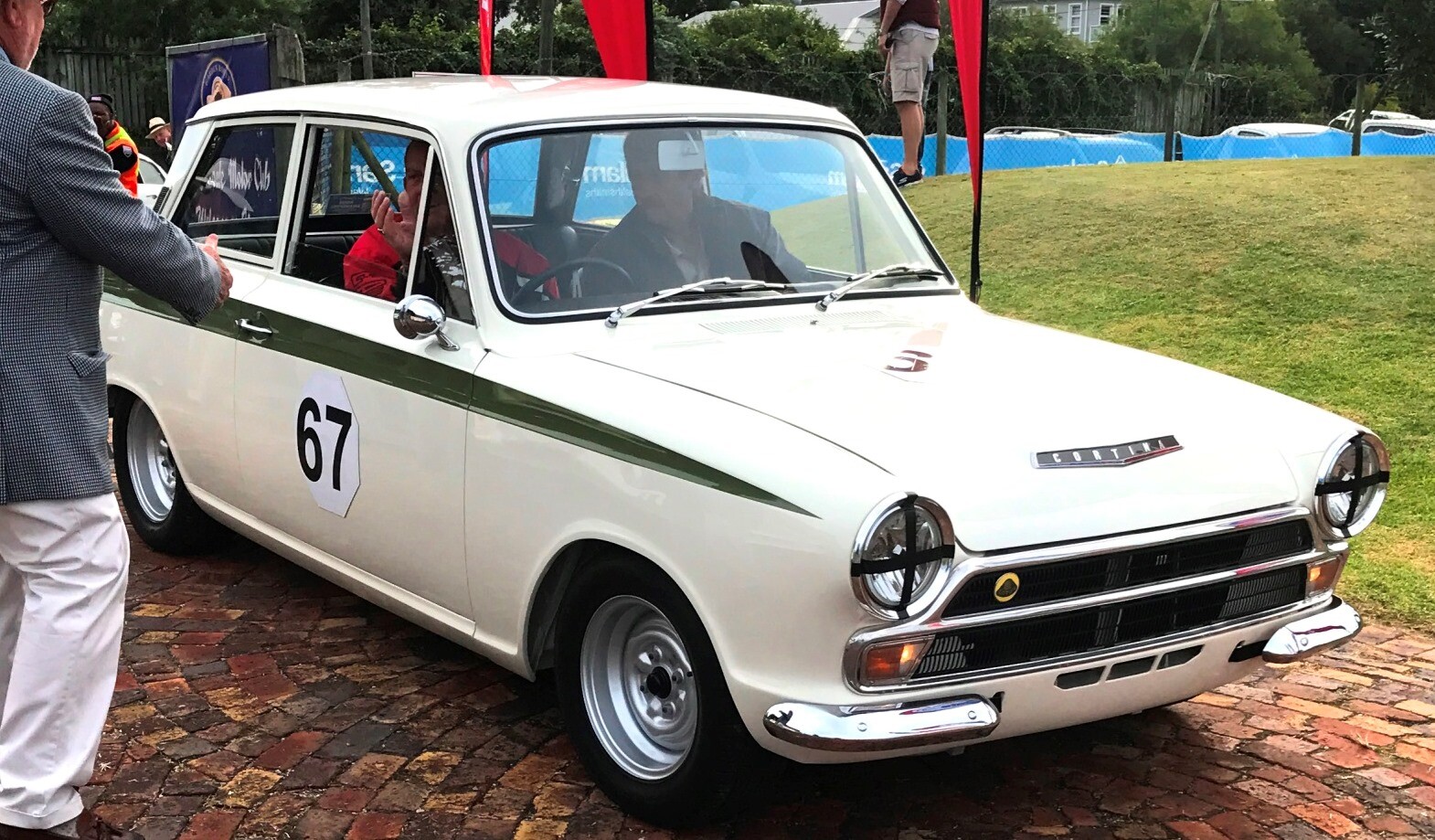 Lotus Cortina circa 1965 arriving at a car show
