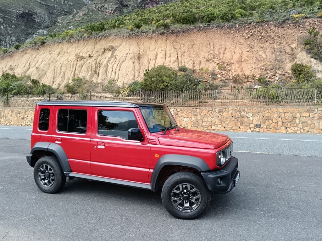 Suzuki Jimny on mountain road