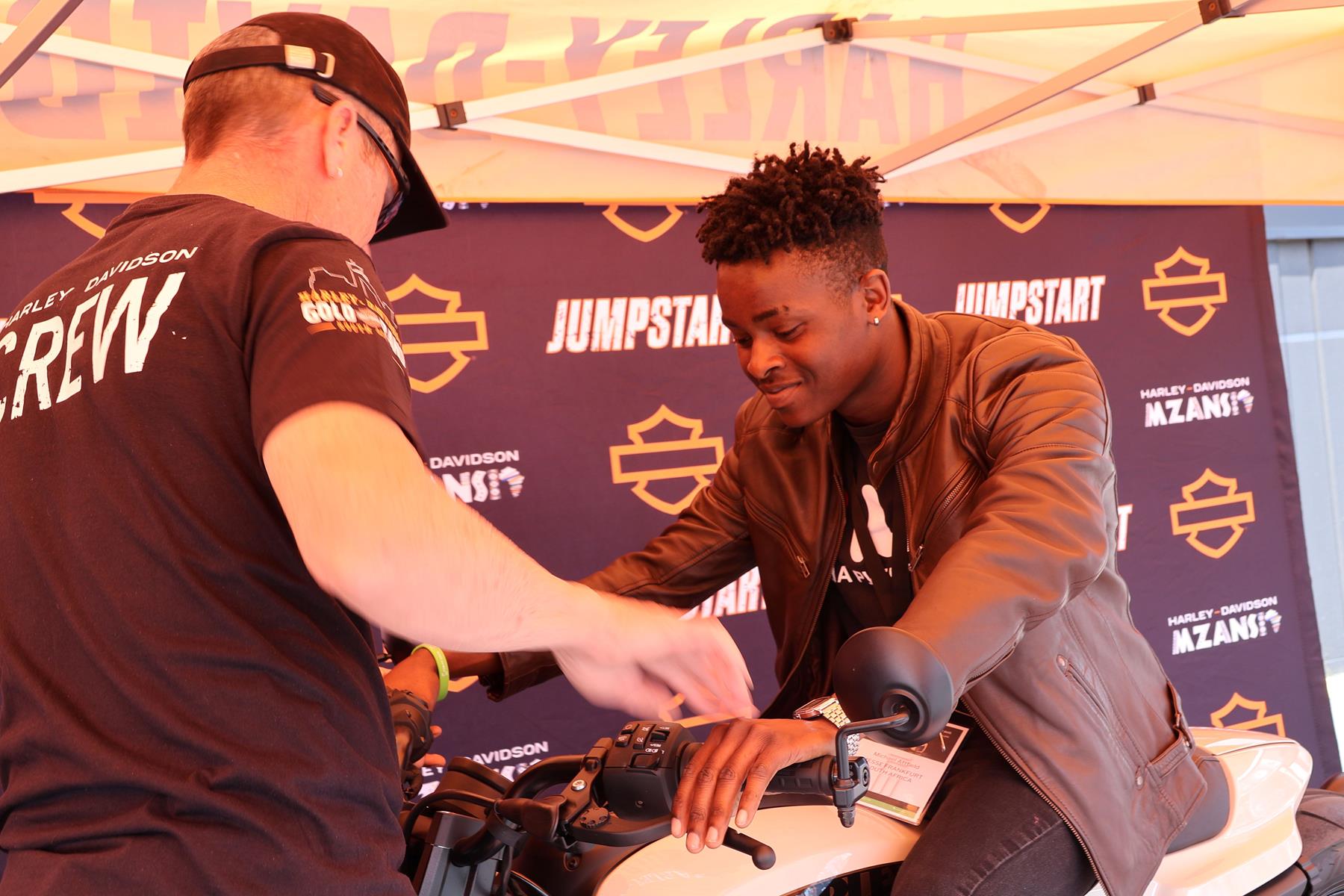 Festival of Motoring with visitor on motorcycle