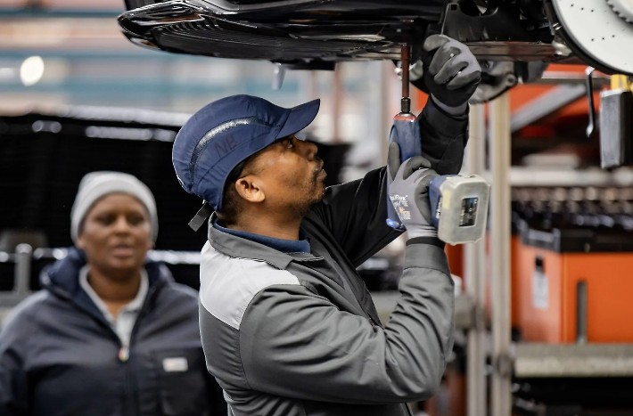 Line worker in Mercedes-Benz plant