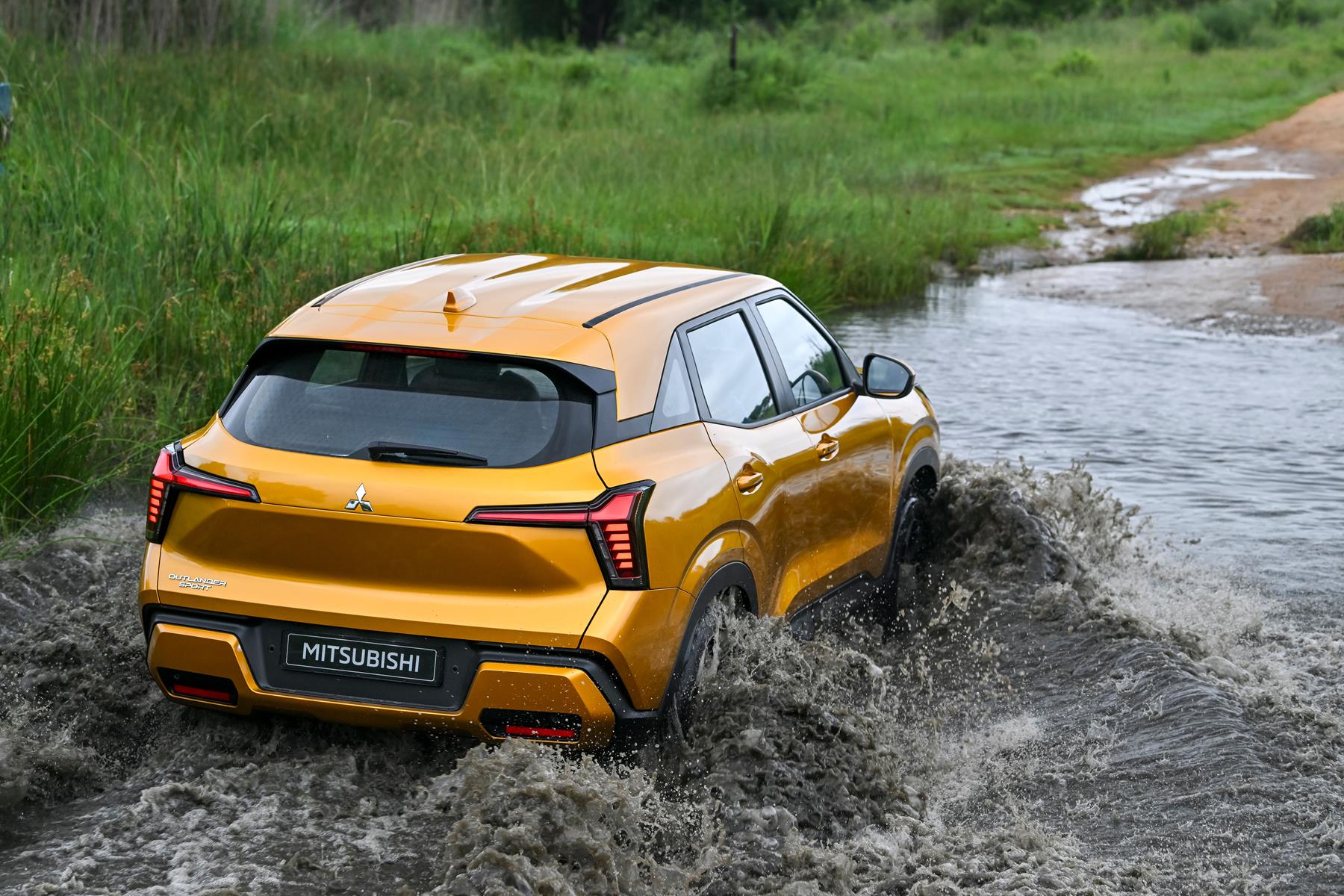 Mitsubishi Outlander Sport rear view in water obstacle